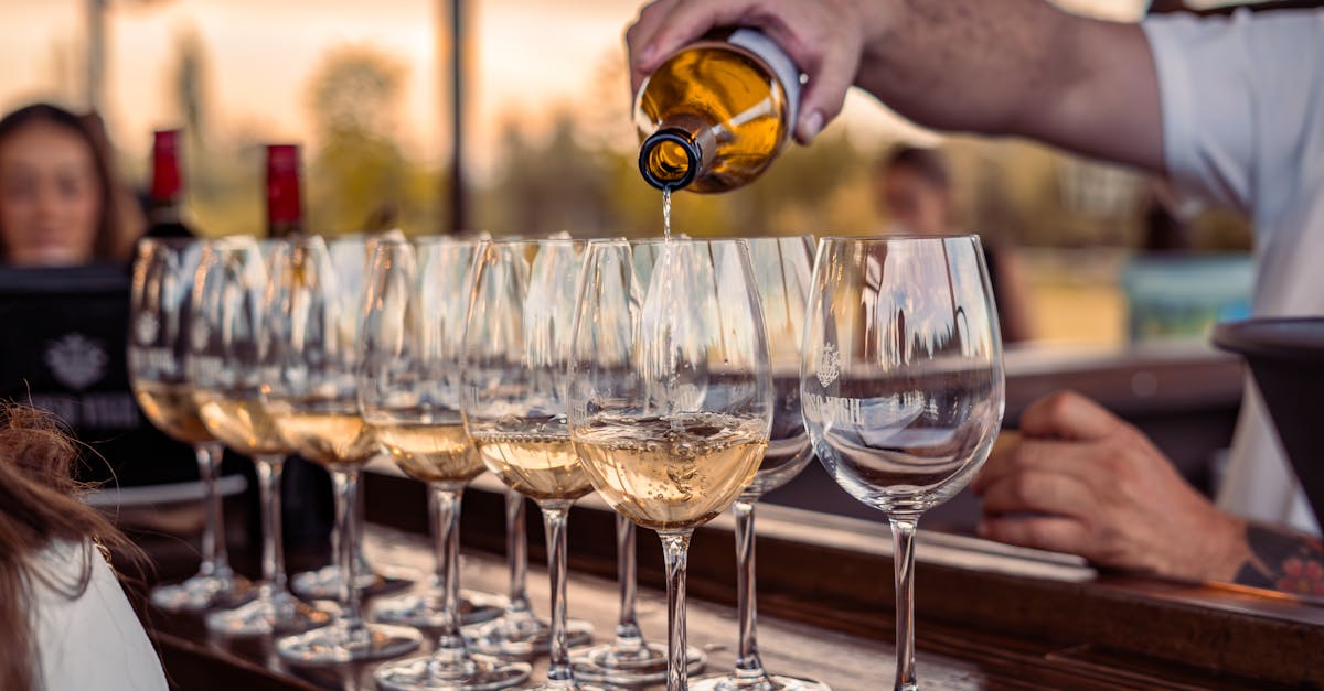 Wine being poured into glasses — alcohol's effect on gut health
