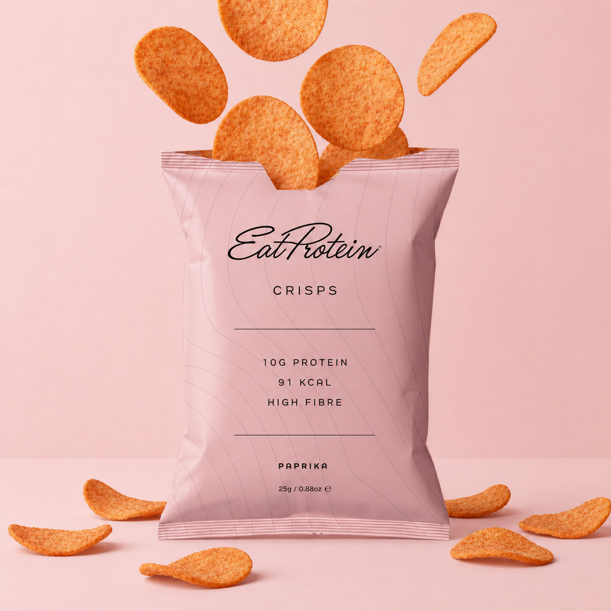 EatProtein Paprika Protein Crisps 25g pack with paprika crisps spilling from the open bag