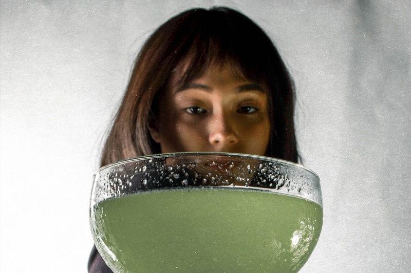 Woman enjoying a healthy wellness drink — collagen-boosted daily routine