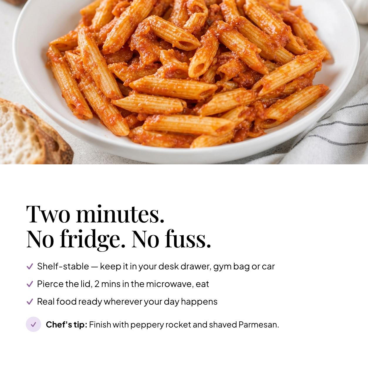 Bowl of EatProtein penne arrabbiata ready meal — shelf stable, pierce the lid and microwave for 2 minutes; chef's tip: finish with peppery rocket and shaved Parmesan